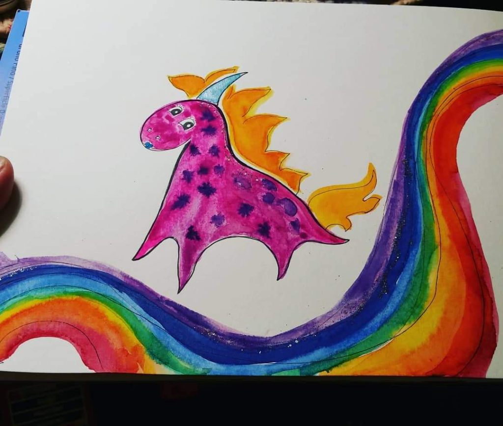 A purple-spotted, magenta lovething with a light blue horn and golden mane runs down a rainbow
